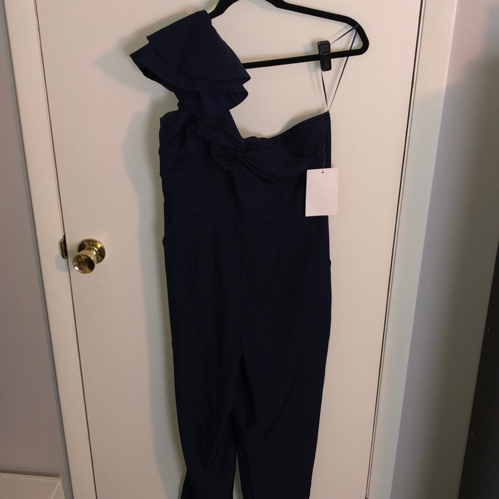 One shoulder jumpsuit in navy size 8 with tags on
